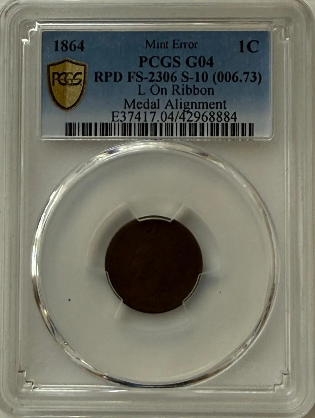 1864 Indian Head Cent PCGS G04 – RPD FS-2306 (S-10) “L” on Ribbon | Medal Alignment Mint Error Heritage Pastime