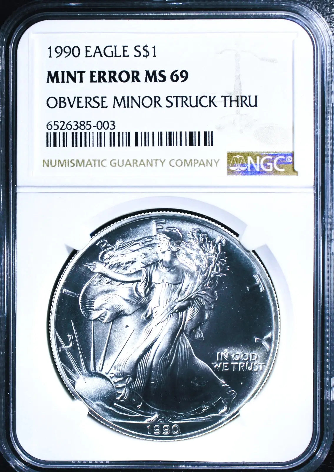 1990 American Silver Eagle MS69 NGC – Obverse Struck-Through Error, Rare Mint Anomaly Coin Hub