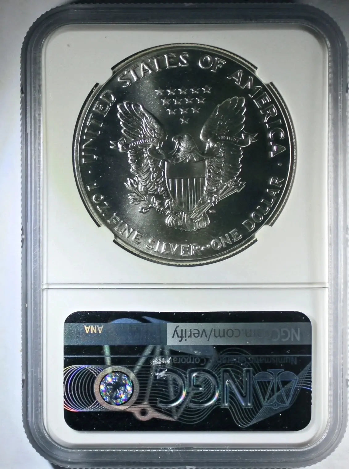 1990 American Silver Eagle MS69 NGC – Obverse Struck-Through Mint Error Heritage Pastime
