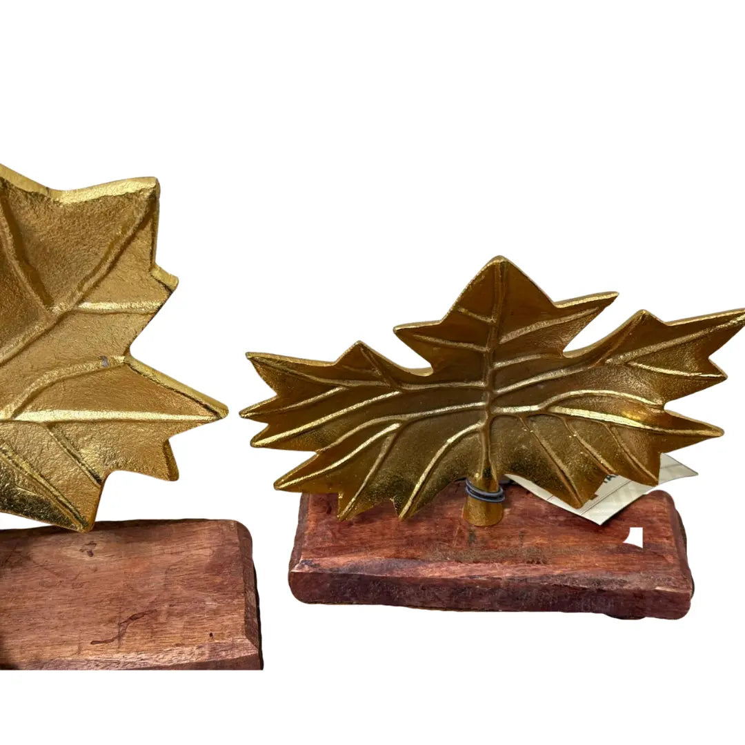 Broyhill Harvest Traditions gold leaf tabletop décor on a wooden base. Coin Hub