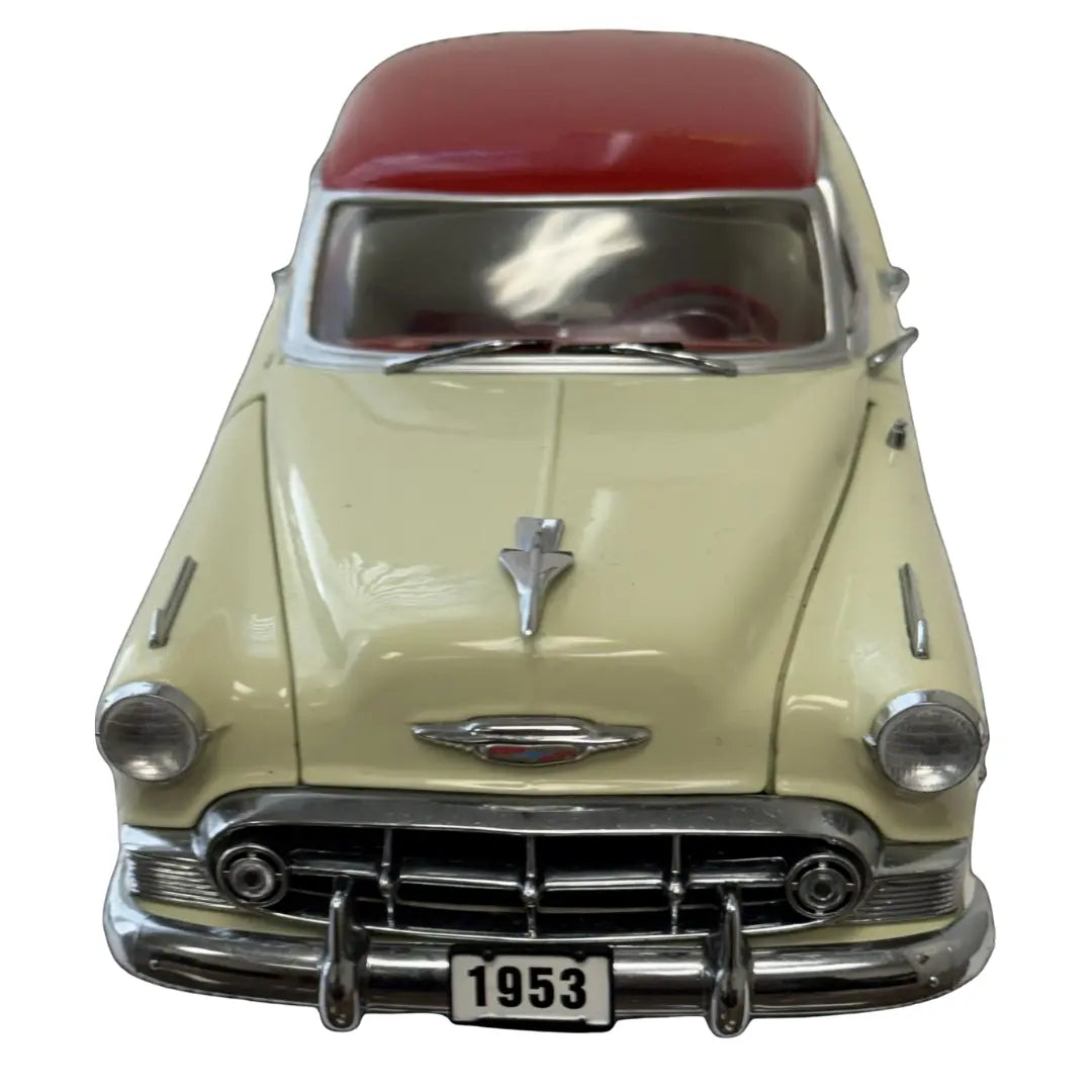Sun Star 1:18 scale diecast replica of a 1953 Chevrolet Bel Air Hard Top Coupe Coin Hub
