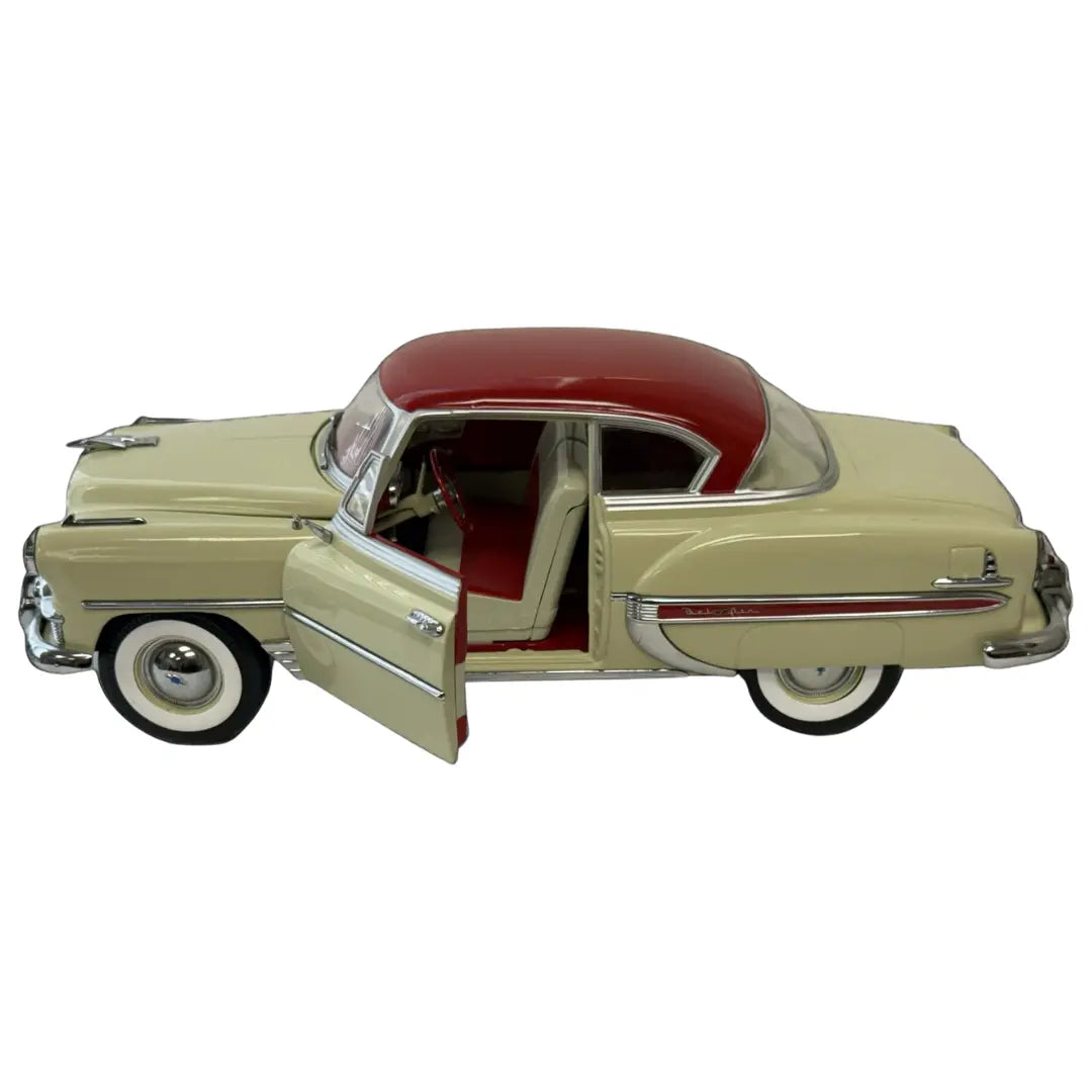 Sun Star 1:18 scale diecast replica of a 1953 Chevrolet Bel Air Hard Top Coupe Coin Hub