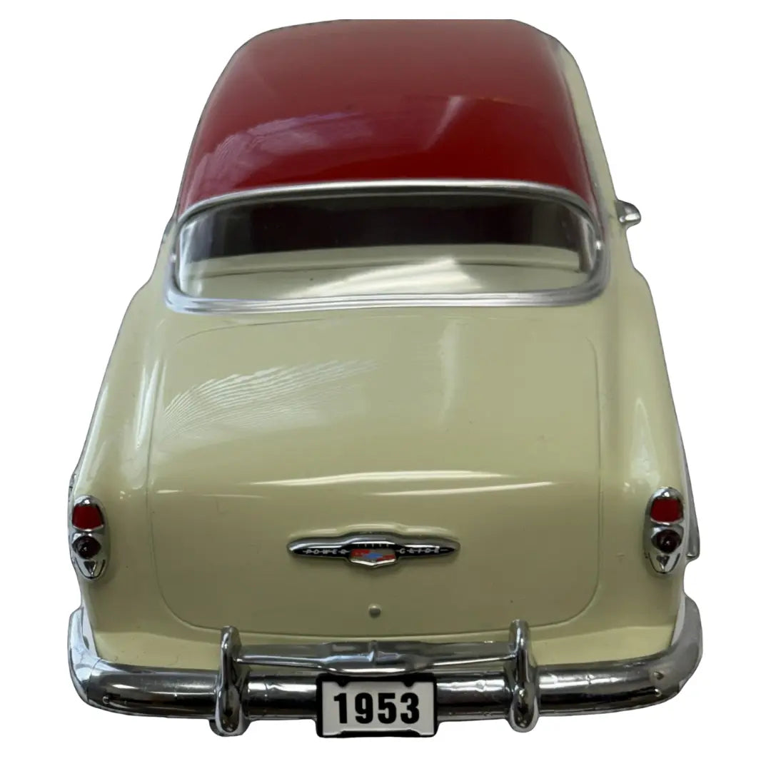 Sun Star 1:18 scale diecast replica of a 1953 Chevrolet Bel Air Hard Top Coupe Coin Hub