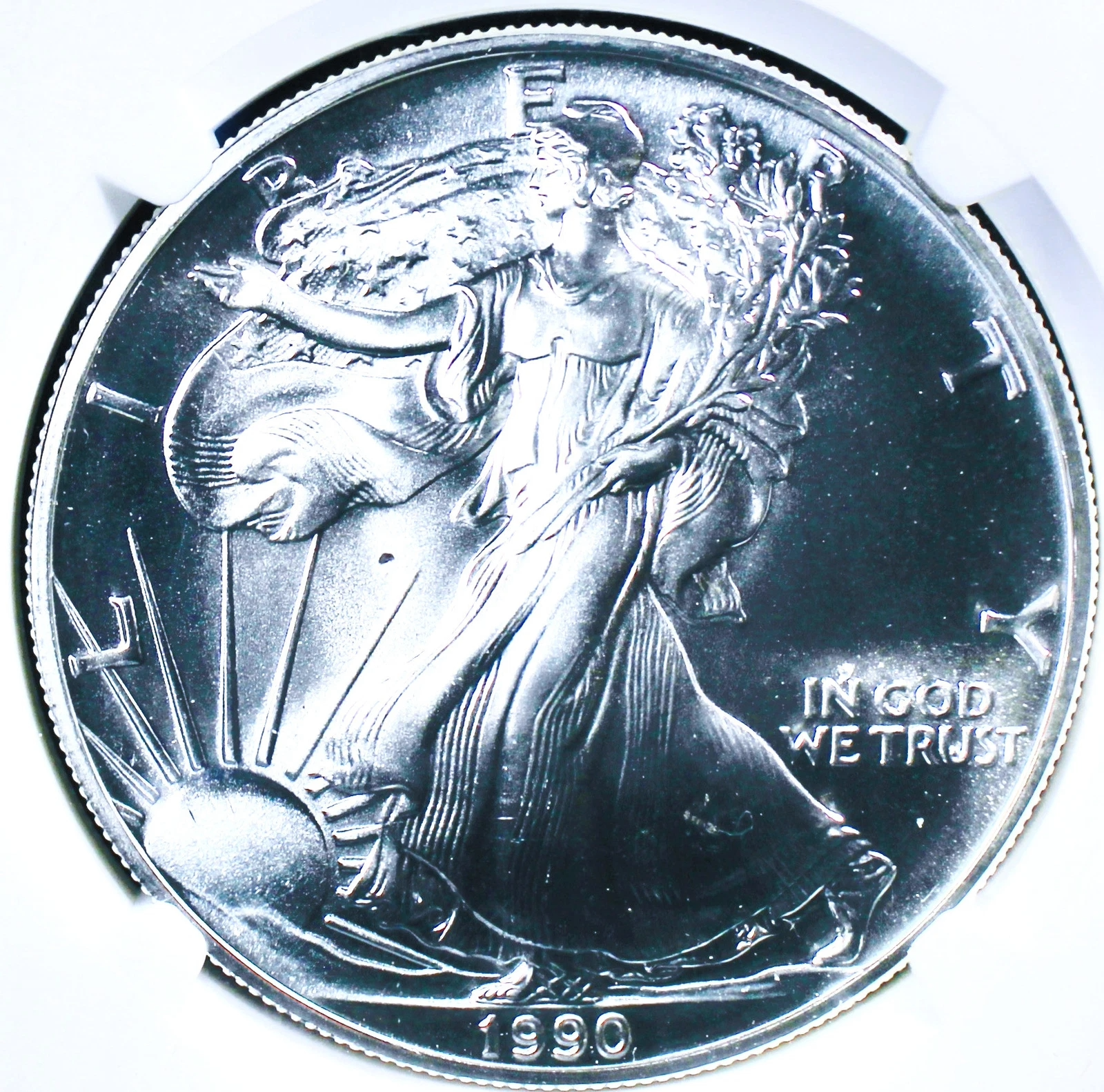 1990 American Silver Eagle - Mint Error Obverse Struck Through - NGC MS-69
