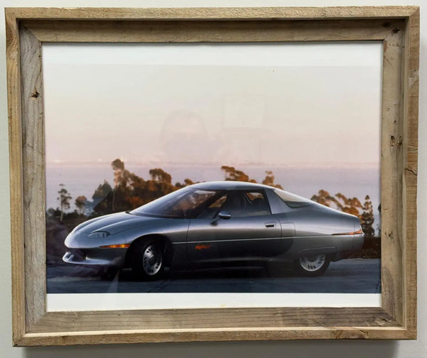 1 of 2 Real Photo taken of the 1990 General Motors Impact concept car, which later went into production as the GM EV1, the first modern mass-produced electric vehicle from a major American automaker. Heritage Pastime