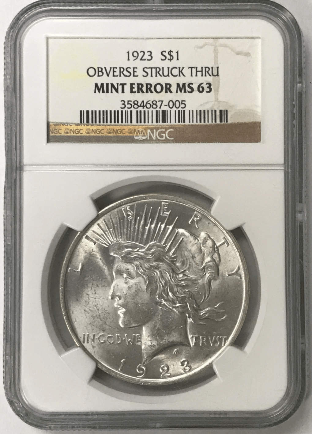 1923 S$1 Obverse Struck Thru Mint Error Peace Dollar obverse Liberty profile