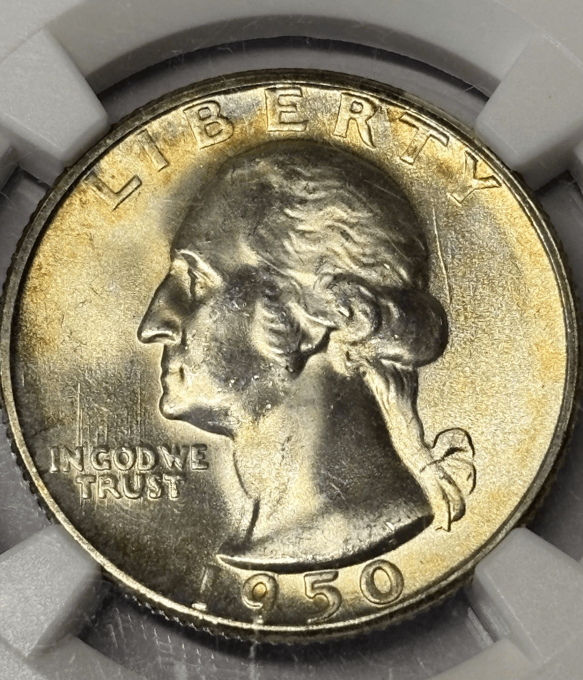 Close-up of 1950-S Washington Quarter obverse with toning