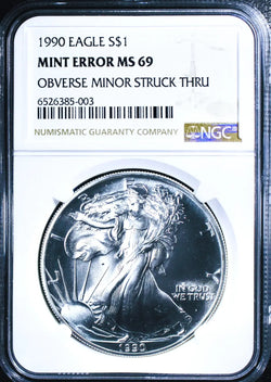 1990 American Silver Eagle MS69 NGC – Obverse Struck-Through Error, Rare Mint Anomaly