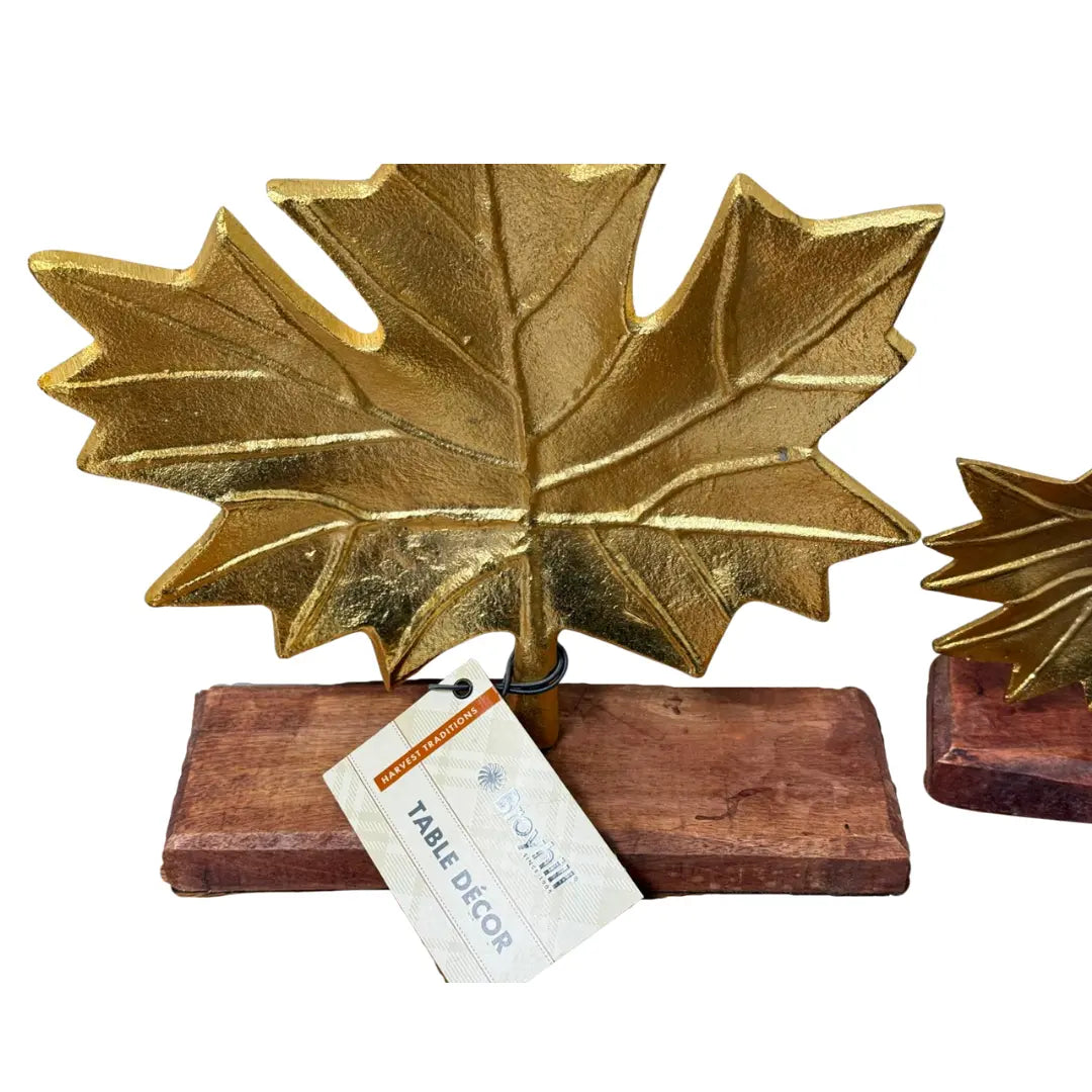 Broyhill Harvest Traditions gold leaf tabletop décor on a wooden base. Coin Hub