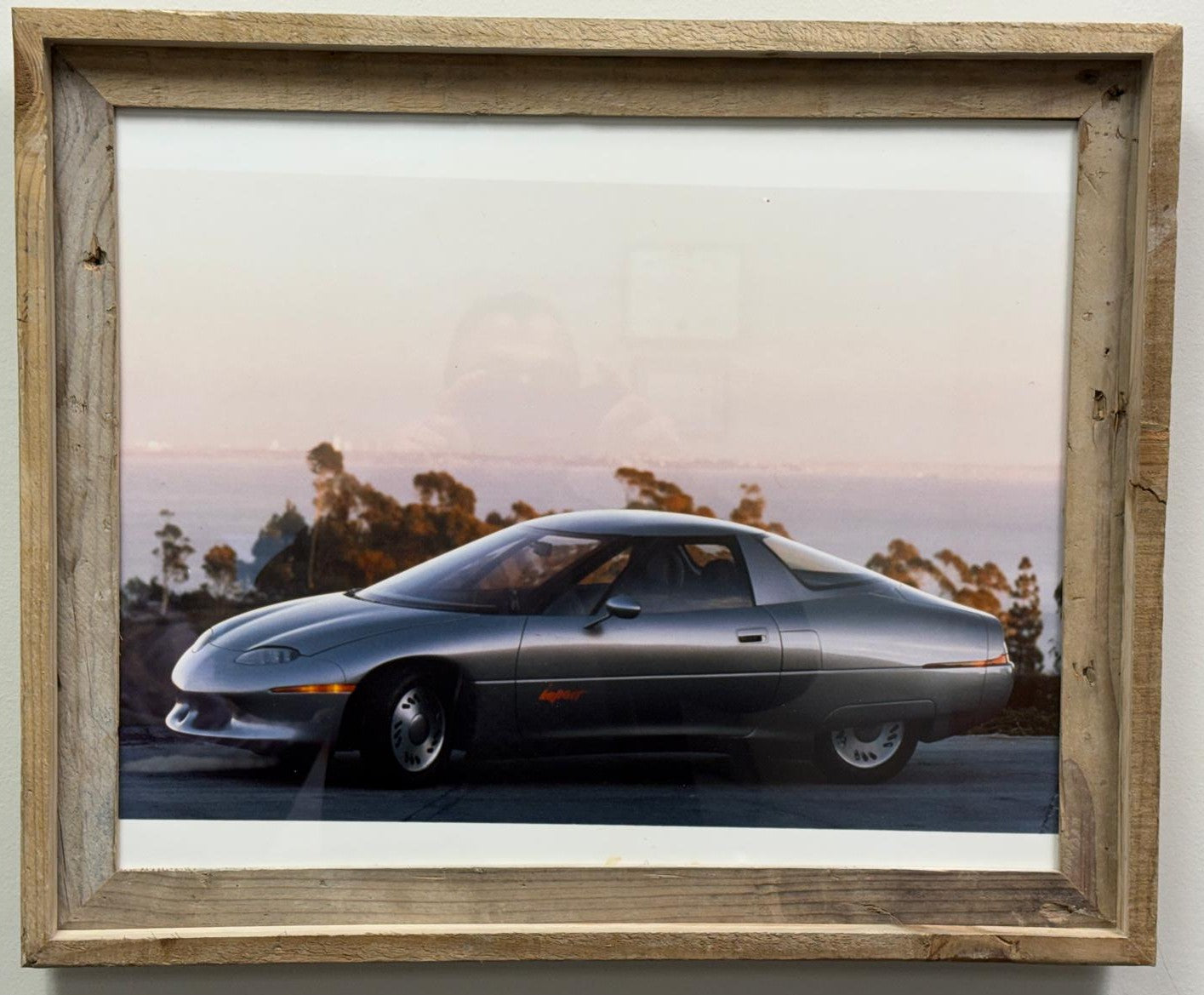 1 of 2 Real Photo taken of  the 1990 General Motors Impact concept car, which later went into production as the GM EV1, the first modern mass-produced electric vehicle from a major American automaker.