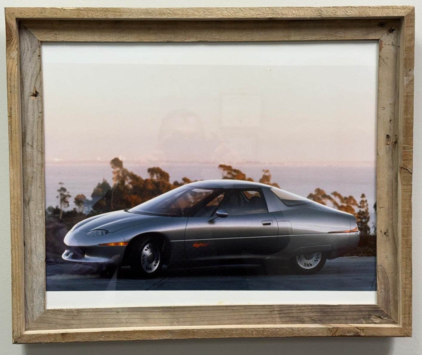 1 of 2 Real Photo taken of  the 1990 General Motors Impact concept car, which later went into production as the GM EV1, the first modern mass-produced electric vehicle from a major American automaker.